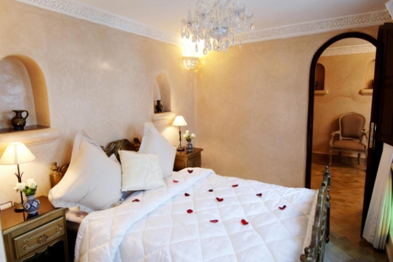 Riad Palais Des Princesses & Spa Marrákes Szoba fotó A bedroom at the hotel